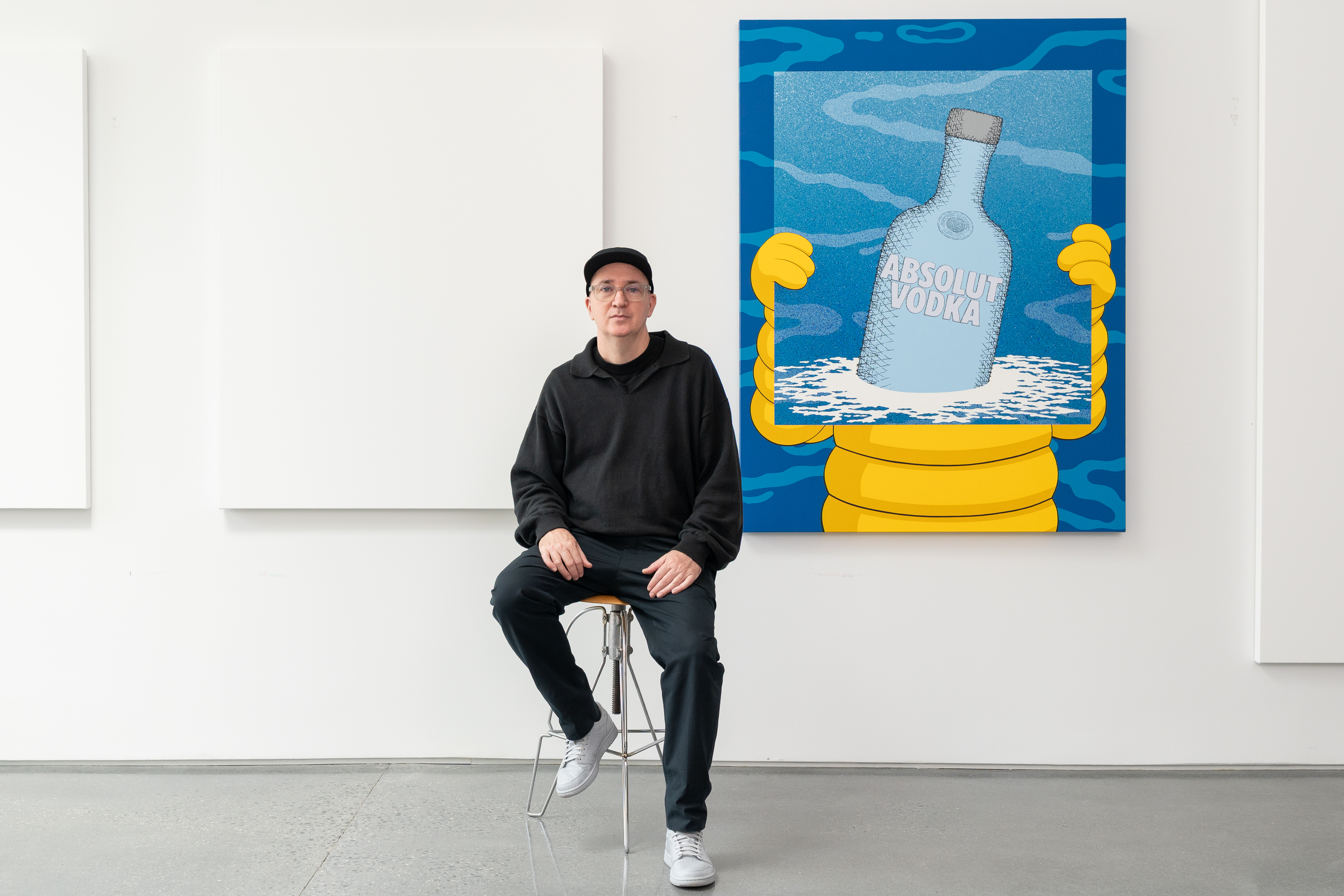 KAWS collaborates with Absolut Vodka on limited-edition bottle and painting.